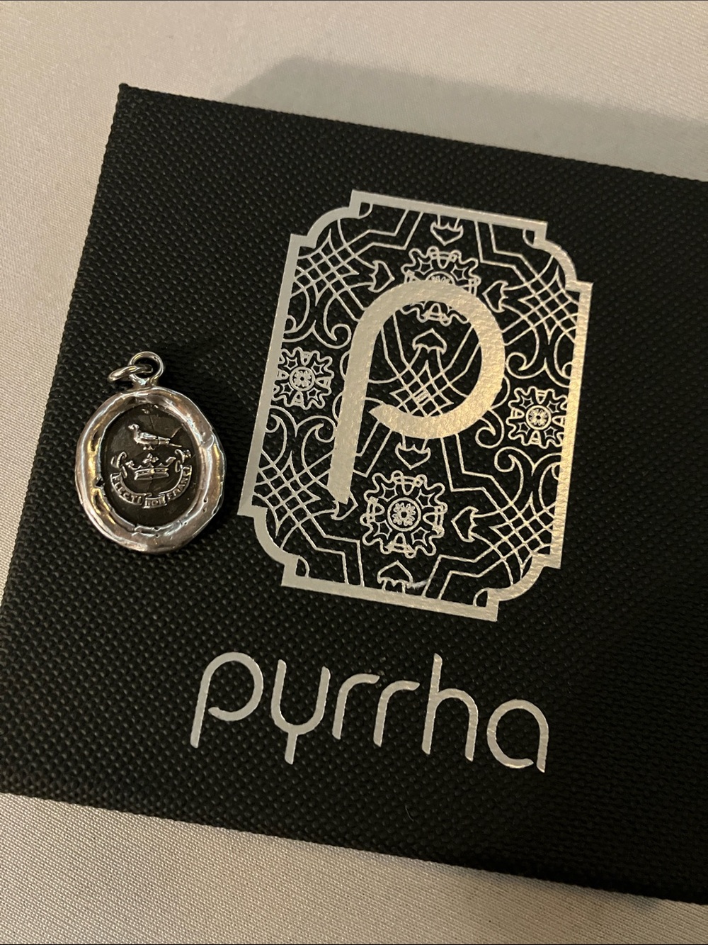 Pyrrha silver talisman bird crown wax seal